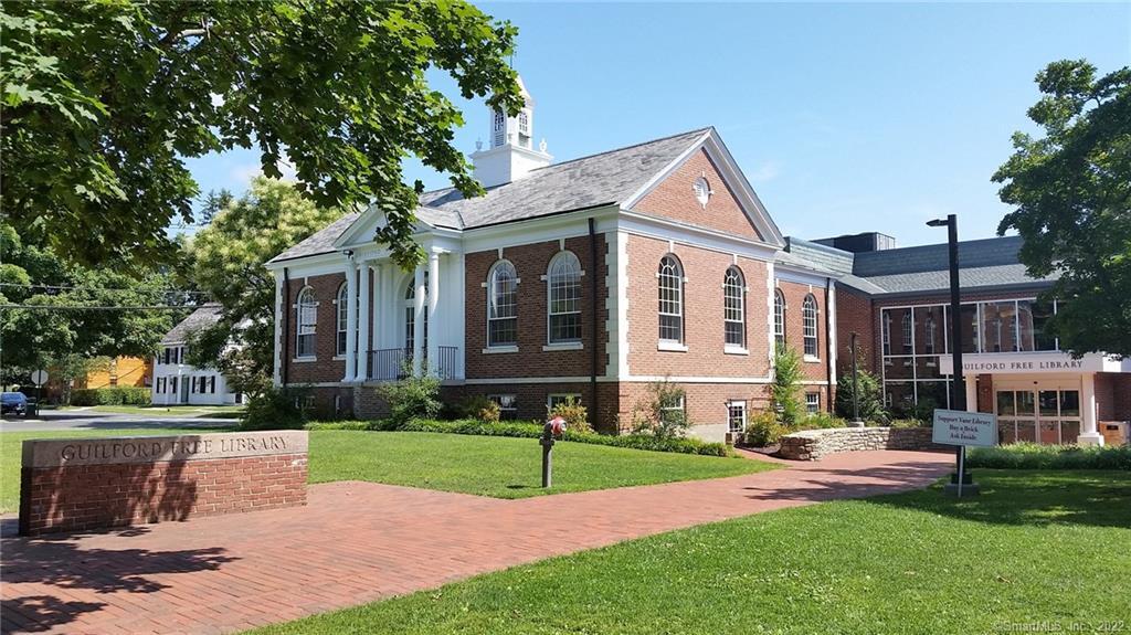 368 Boston Street Guilford, CT 06437 - Photo 20 of 24 a view of a house with a yard and sitting area
