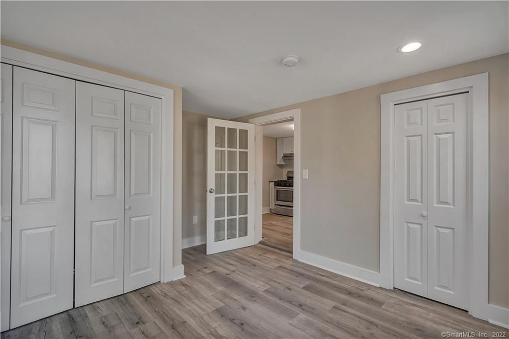 368 Boston Street Guilford, CT 06437 - Photo 4 of 24 wooden floor and windows in a room