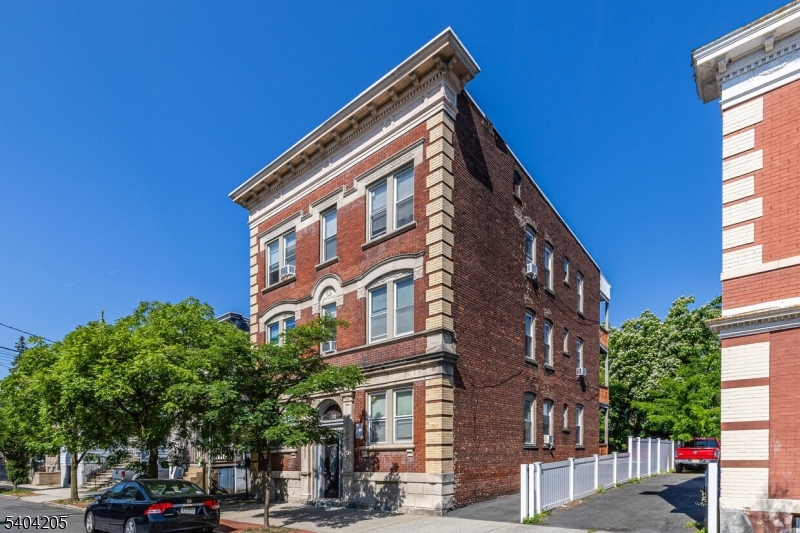 a view of a building with a street
