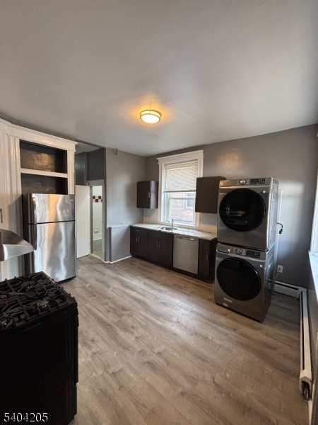 108 Pine Street, Unit 1 Montclair, NJ 07042 - Photo 7 of 9 a view of a kitchen with refrigerator and stove