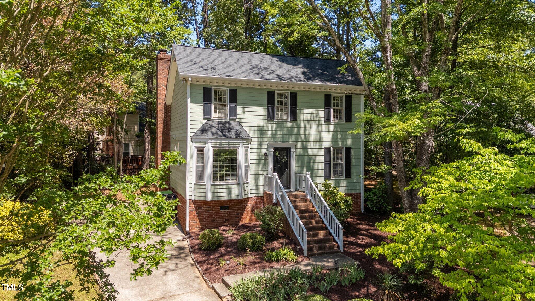 6904 Sandringham Drive Raleigh, NC 27613 - Photo 2 of 31 1-web-or-mls-DJI_20250507135410_0703_D