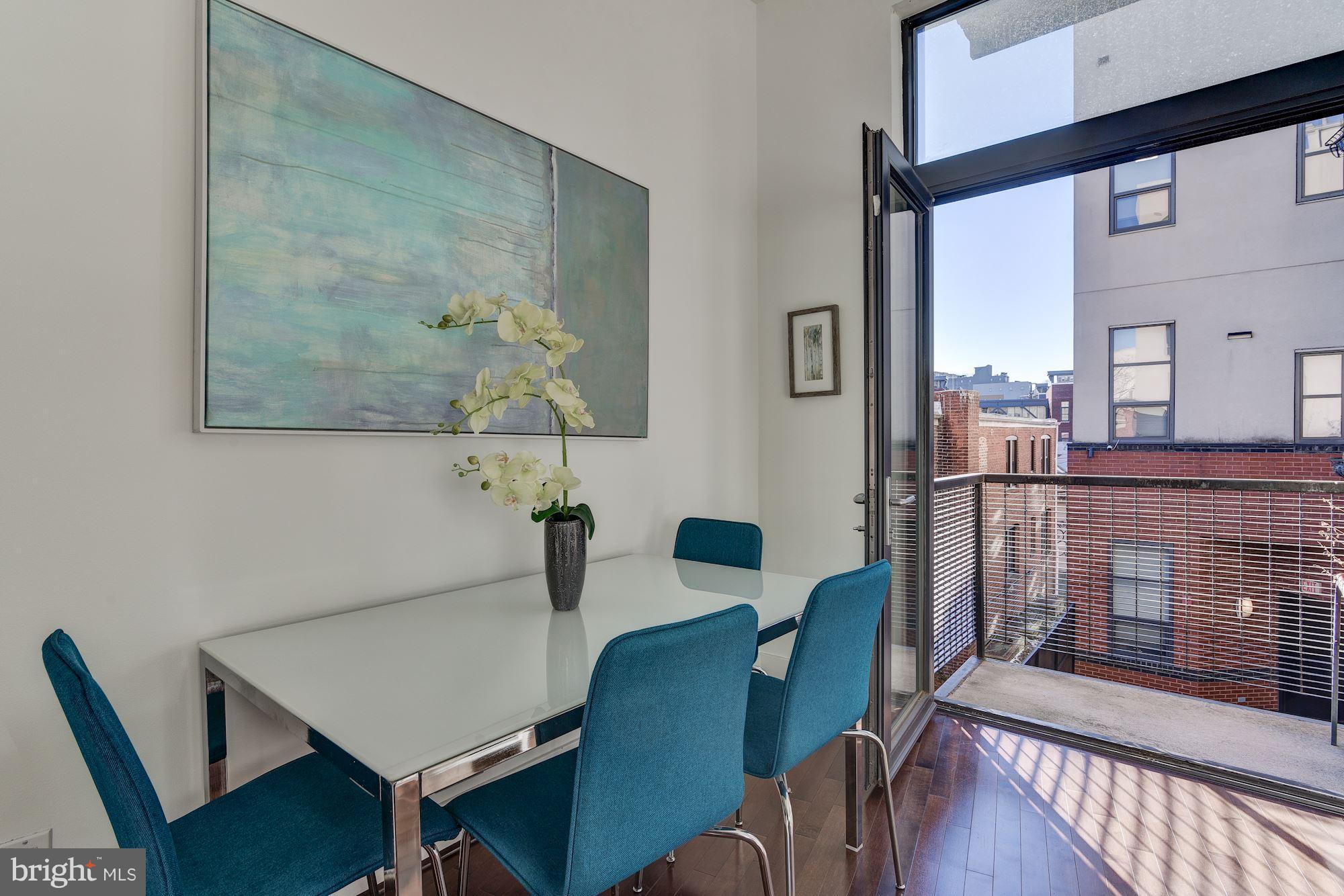 2426 Ontario Road Northwest, Unit 304 Washington, DC 20009 - Photo 11 of 30 Dining Room to Balcony