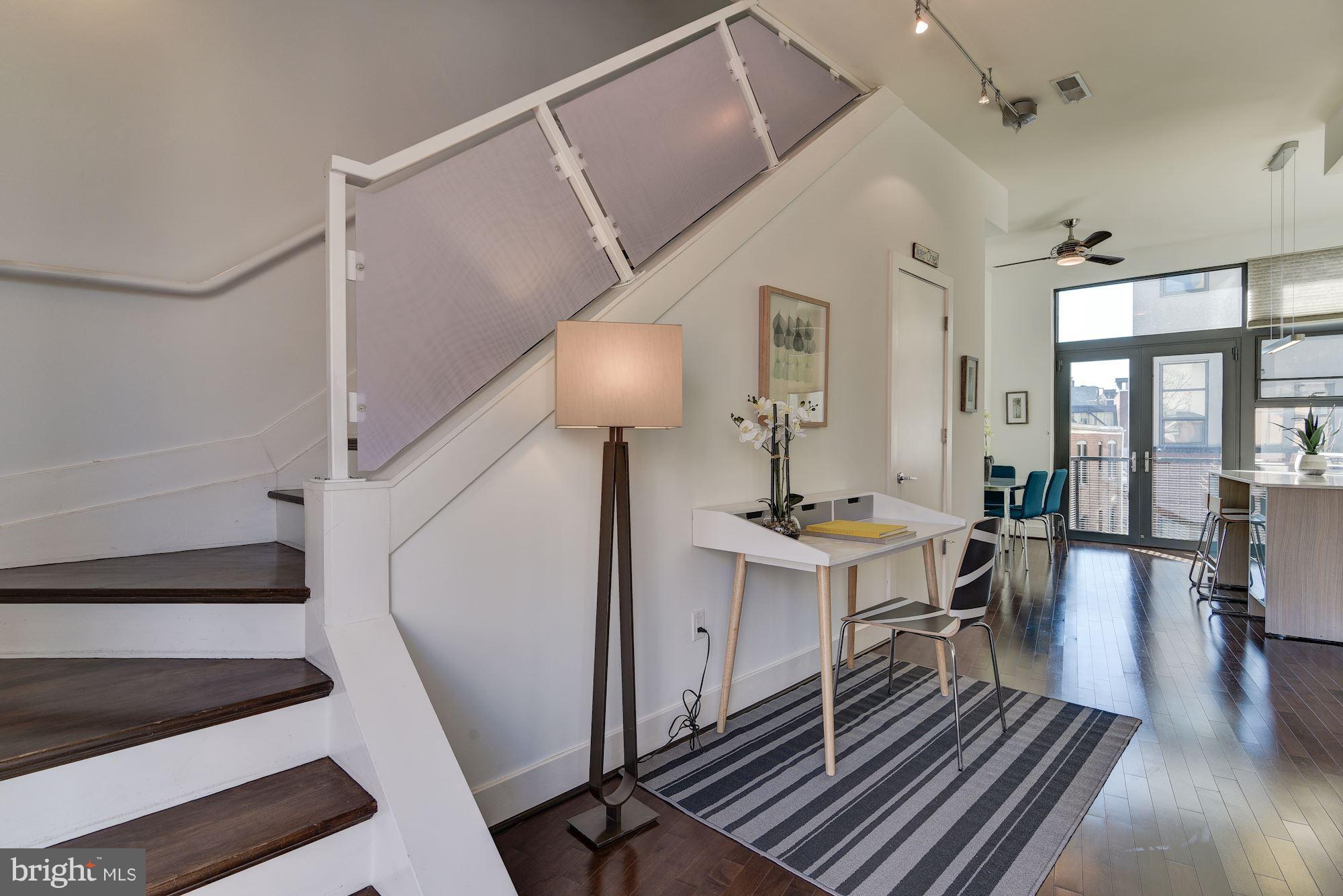 2426 Ontario Road Northwest, Unit 304 Washington, DC 20009 - Photo 14 of 30 Dramatic staircase to 2nd lvl
