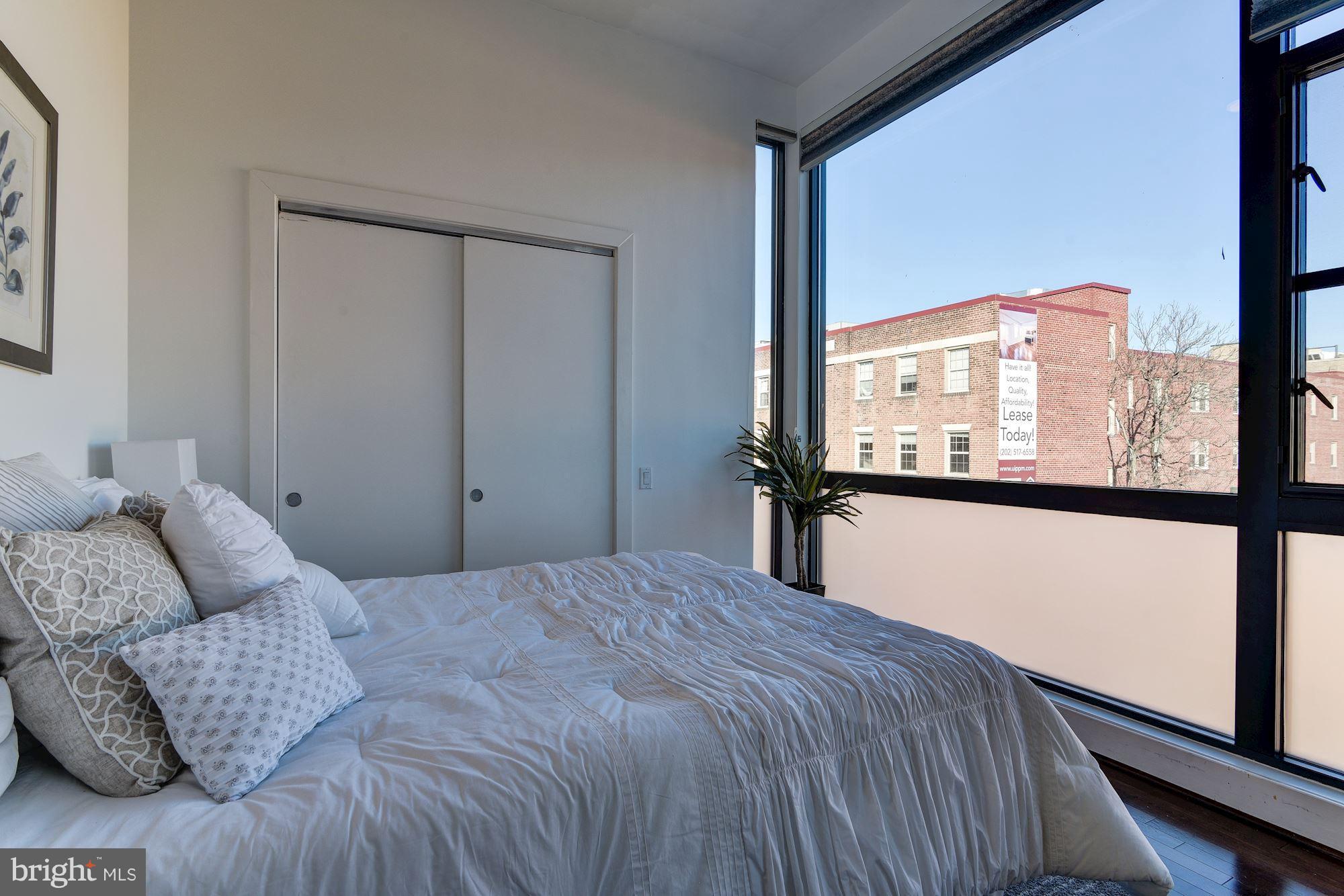 2426 Ontario Road Northwest, Unit 304 Washington, DC 20009 - Photo 18 of 30 Bedroom Suite #2 with floor to ceiling windows!