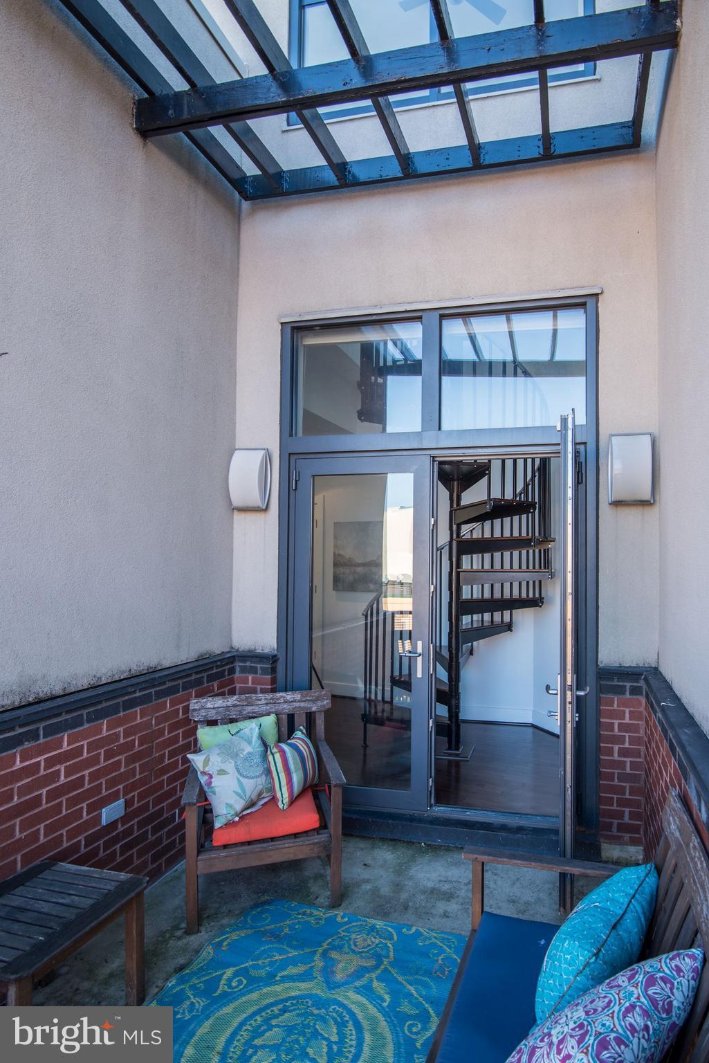 2426 Ontario Road Northwest, Unit 304 Washington, DC 20009 - Photo 22 of 30 Large balcony #3 with Pergola
