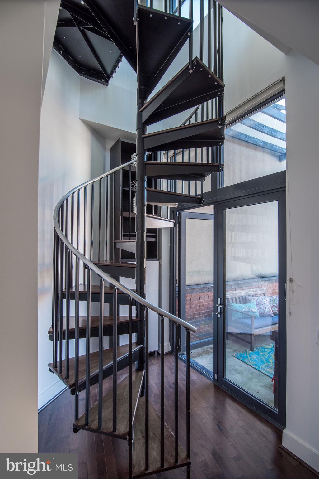 2426 Ontario Road Northwest, Unit 304 Washington, DC 20009 - Photo 23 of 30 Stairs to roof deck den & main deck!
