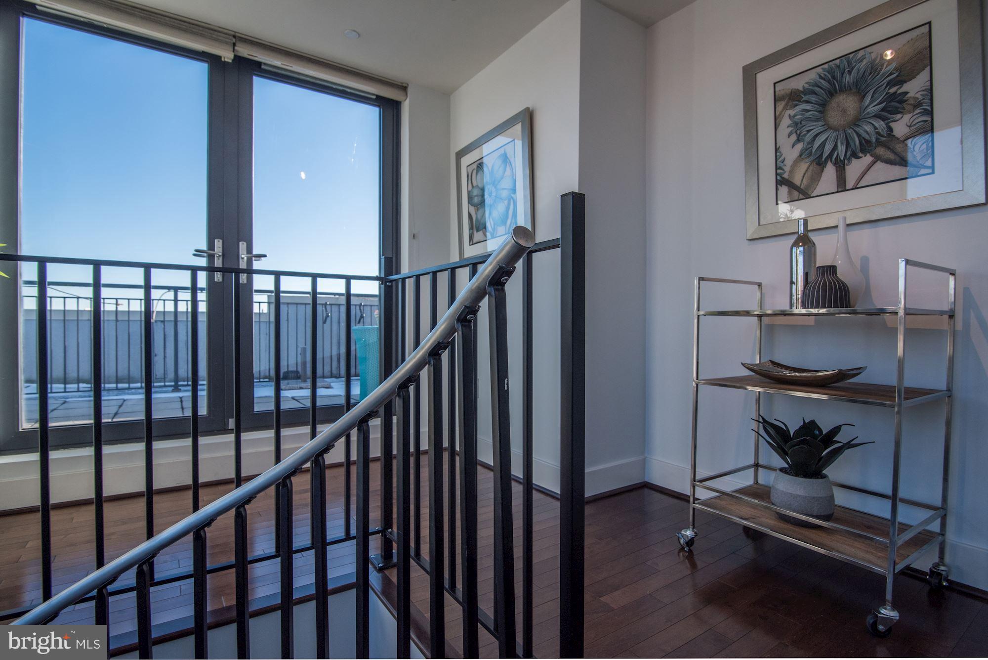 2426 Ontario Road Northwest, Unit 304 Washington, DC 20009 - Photo 24 of 30 Den space en route roof!
