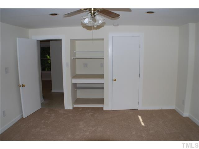 5212 Carter Street Raleigh, NC 27612 - Photo 13 of 19 Downstairs large room with closet