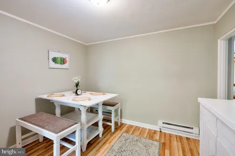 a view of a dining room with furniture
