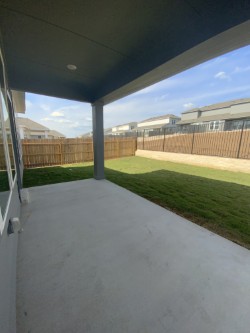 2240 Delano Drive Leander, TX 78641 - Photo 29 of 32 Fenced backyard with a patio area