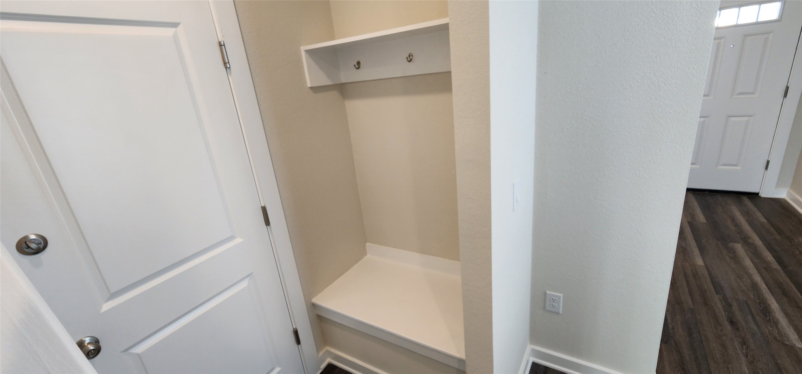 2240 Delano Drive Leander, TX 78641 - Photo 5 of 32 Mudroom with dark wood-style floors and baseboards