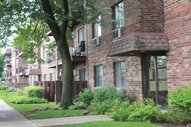 a brick building with a large windows