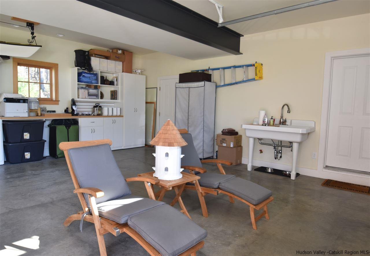 555 Milan Hill Road Red Hook, NY 12571 - Photo 24 of 29 a living room with furniture a window and a table