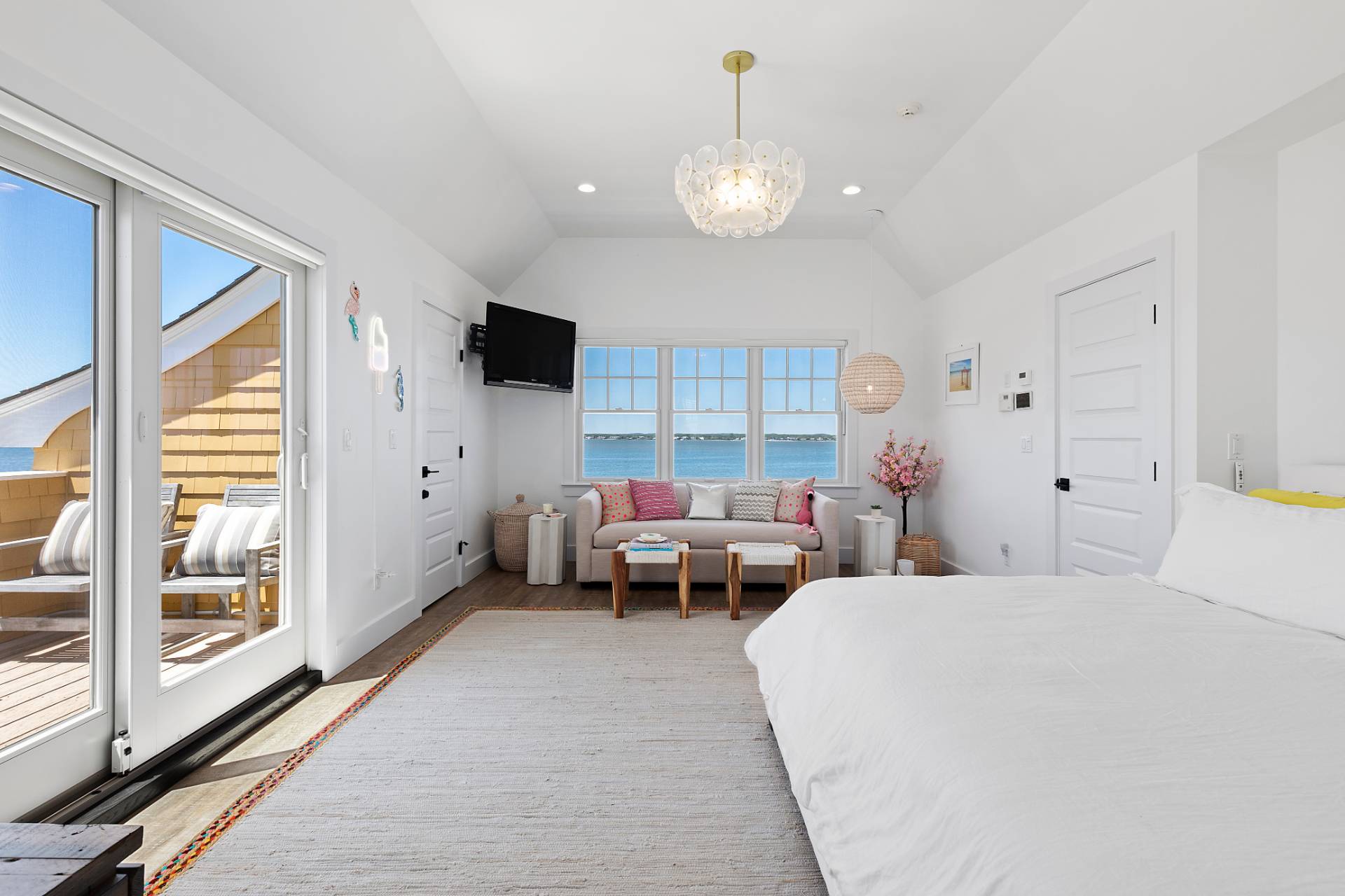 650 Dune Road Westhampton, NY 11978 - Photo 12 of 22 a living room with furniture and a flat screen tv