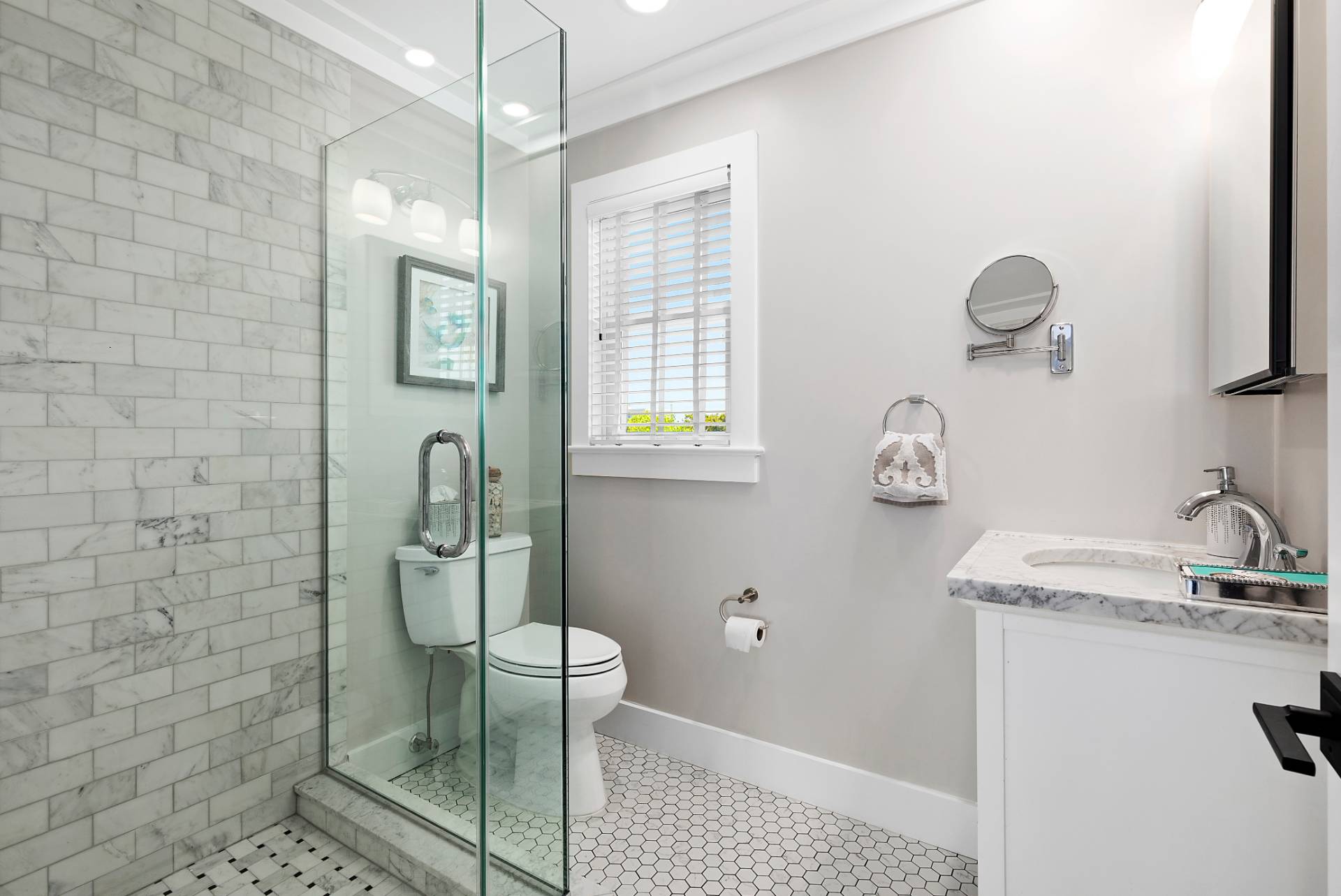 650 Dune Road Westhampton, NY 11978 - Photo 15 of 22 a bathroom with a granite countertop toilet sink and mirror