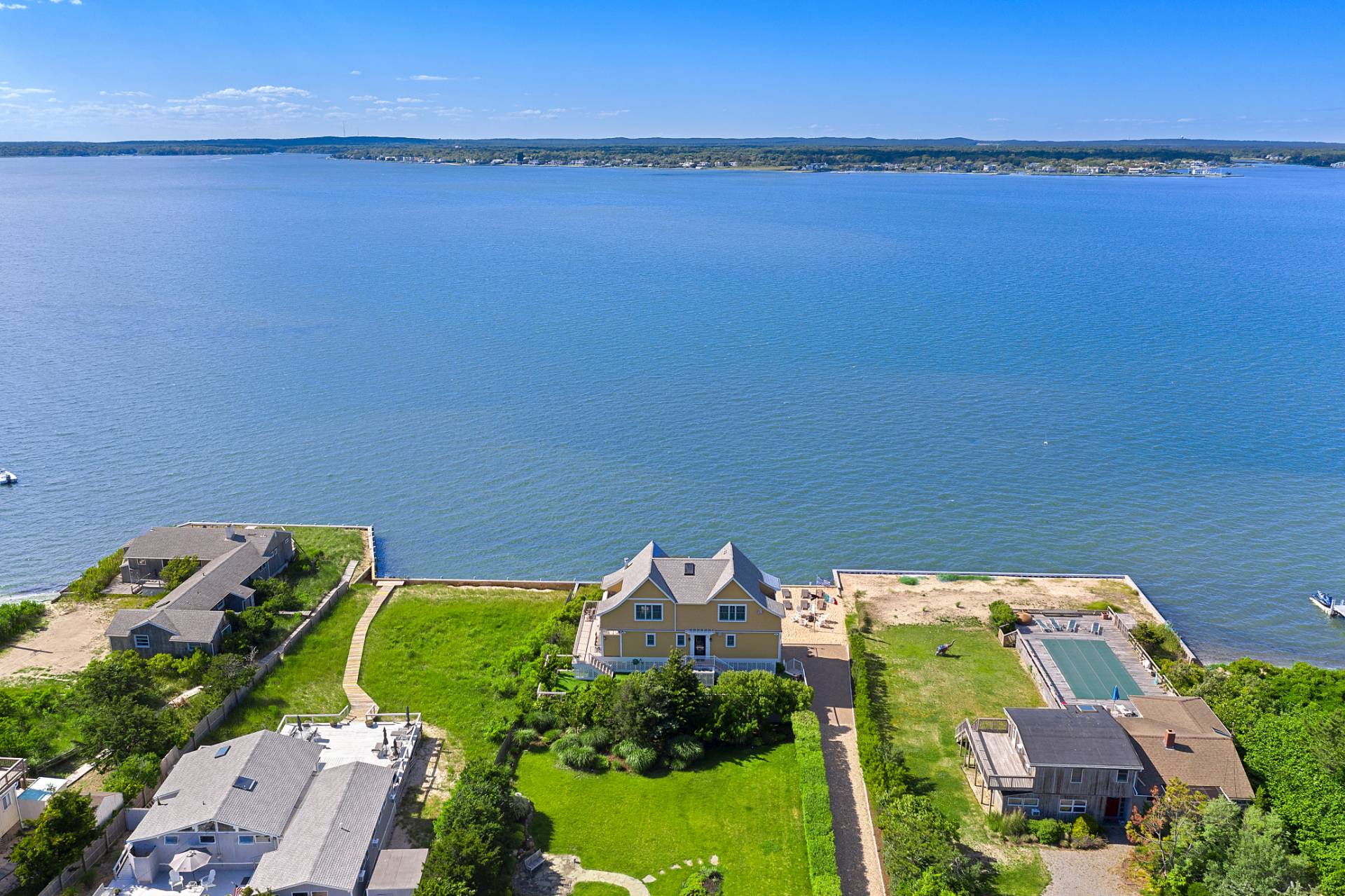 650 Dune Road Westhampton, NY 11978 - Photo 19 of 22 an aerial view of a house with a garden