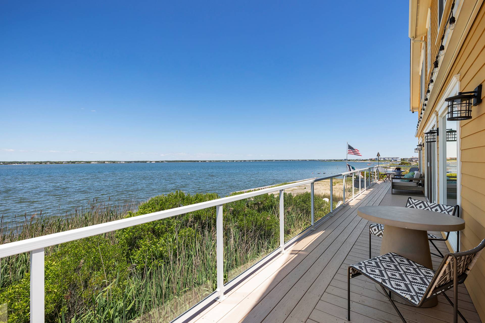 650 Dune Road Westhampton, NY 11978 - Photo 4 of 22 a view of balcony with seating space
