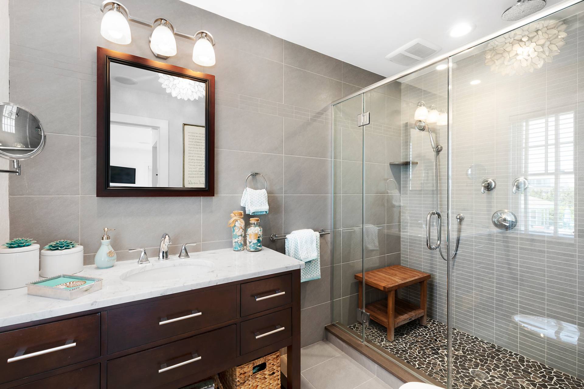 650 Dune Road Westhampton, NY 11978 - Photo 9 of 22 a bathroom with a sink a toilet and shower
