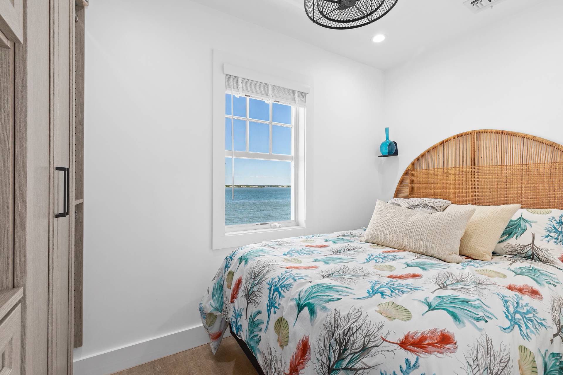 650 Dune Road Westhampton, NY 11978 - Photo 10 of 22 a bedroom with a bed and a window