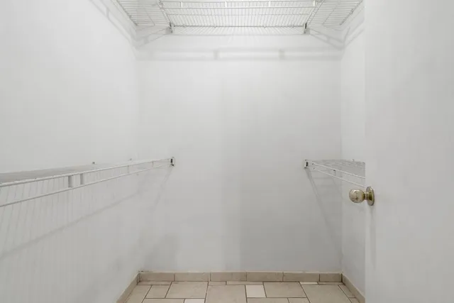 a view of a room with racks on the wall