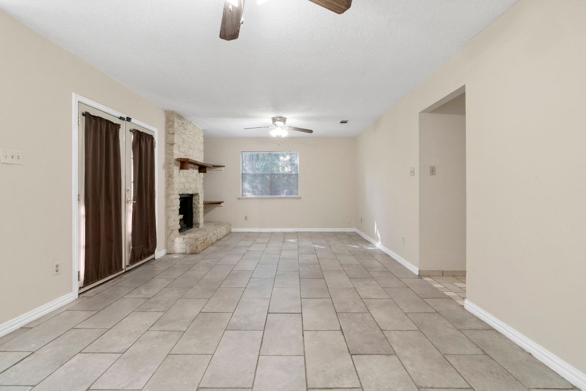 7703 Peaceful Hill Lane, Unit B Austin, TX 78745 - Photo 19 of 22 a view of a livingroom with a pathway