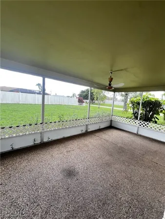 a view of a back yard of the house