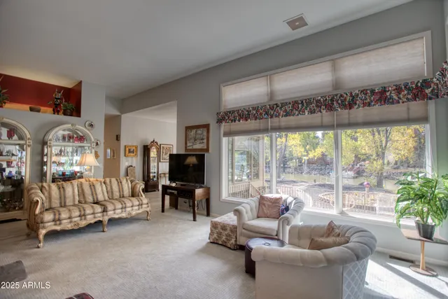 a living room with furniture or couch and a fireplace