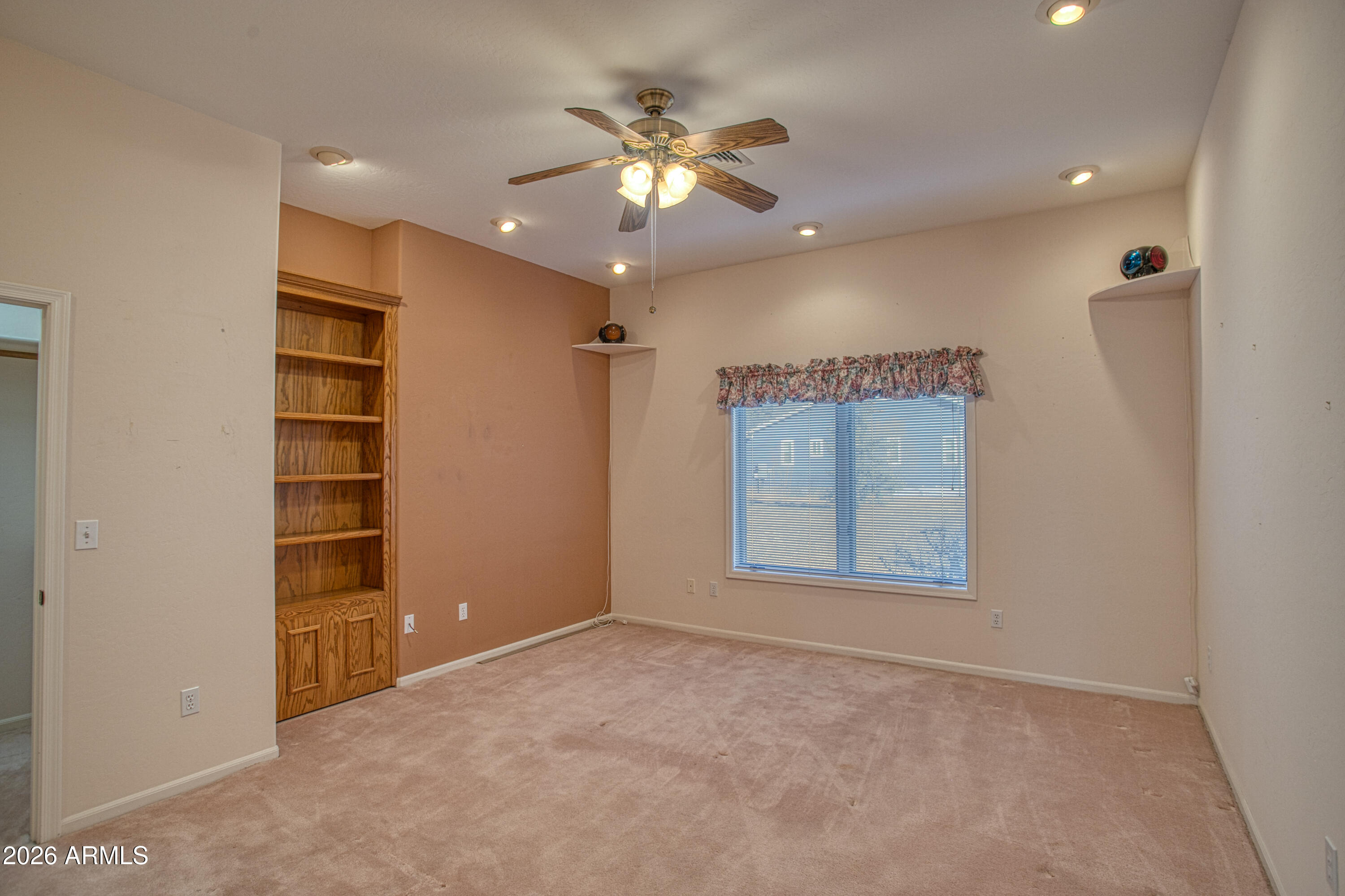 2457 Dragonfly Lane Pinetop-Lakeside, AZ 85929 - Photo 24 of 35 an empty room with closet and fan