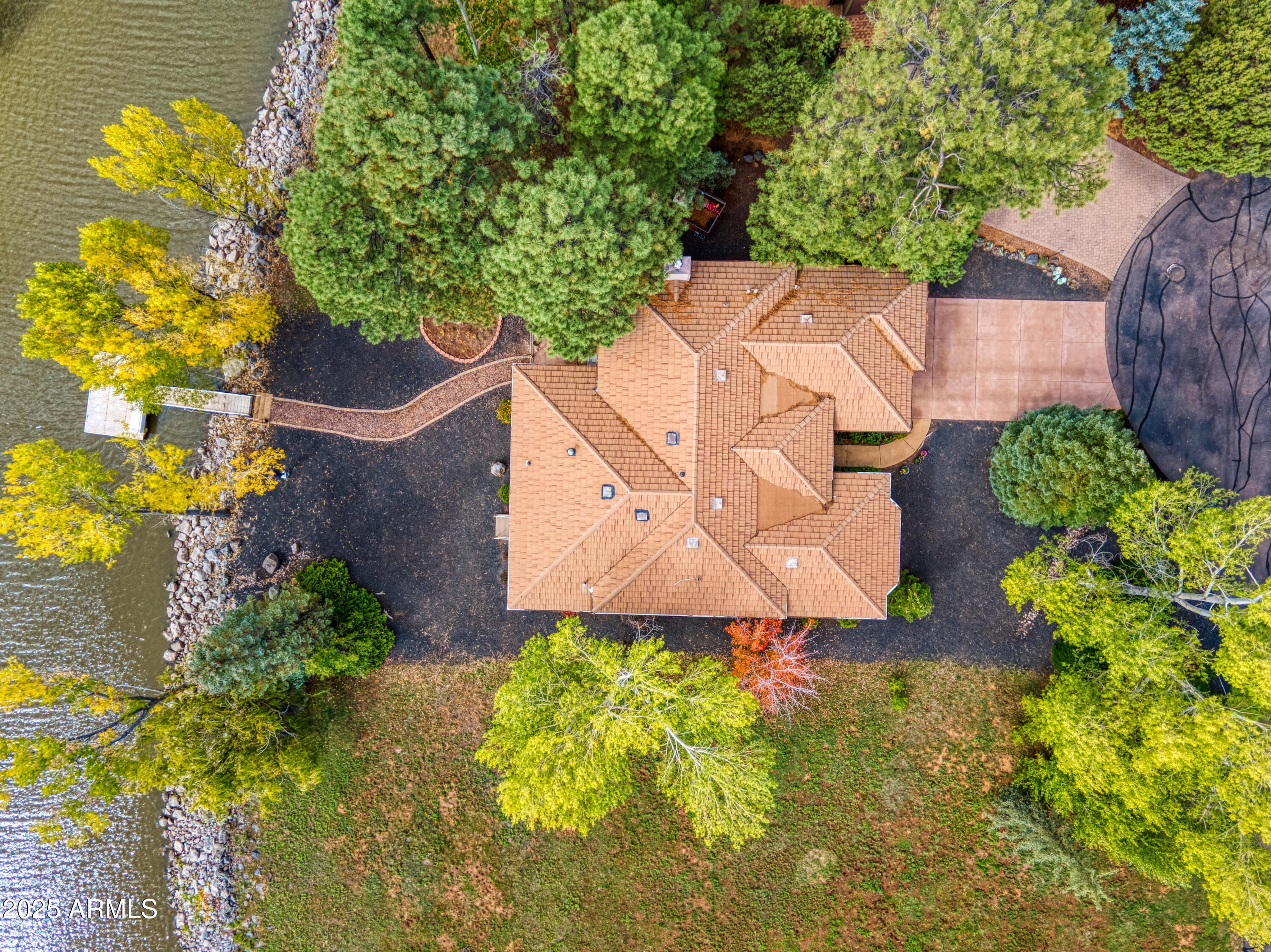 2457 Dragonfly Lane Pinetop-Lakeside, AZ 85929 - Photo 4 of 35 an aerial view of a house with swimming pool and garden