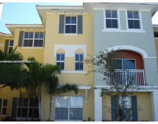 a front view of a house with yard