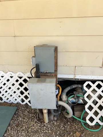 a utility room with sink dryer and washer