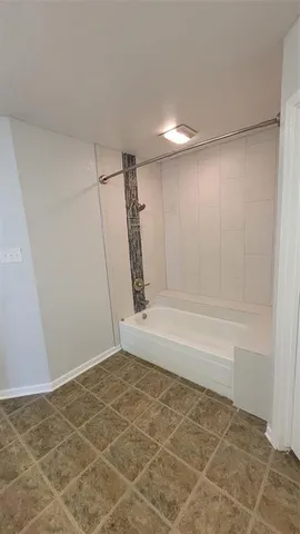 a bathroom with a double vanity sink a toilet and a mirror