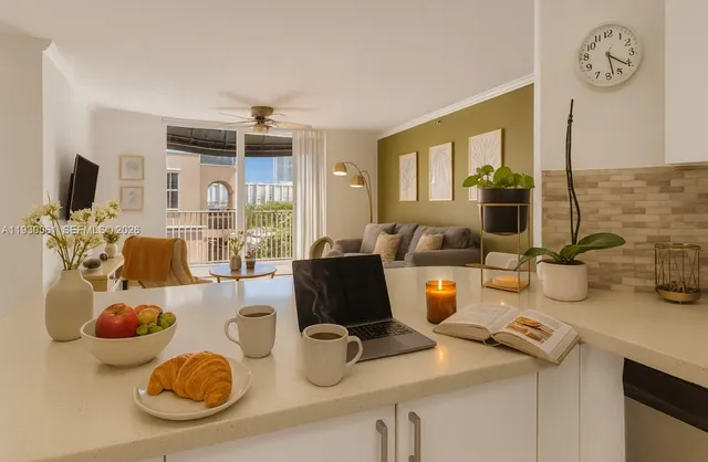 a kitchen with a sink and a stove