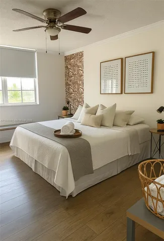 a bedroom with a bed and window