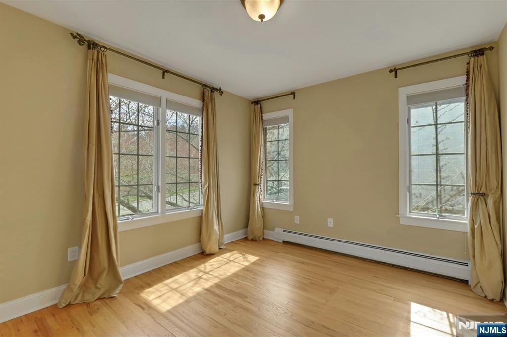 520 Homans Avenue Closter, NJ 07624 - Photo 21 of 34 a view of an empty room with a window