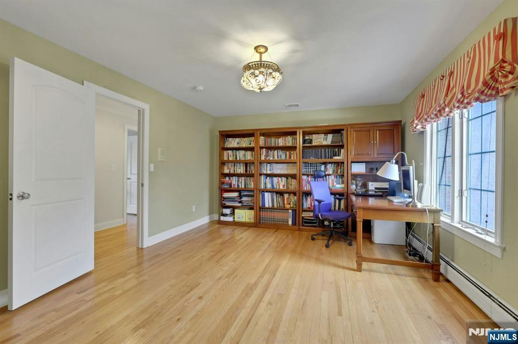 520 Homans Avenue Closter, NJ 07624 - Photo 25 of 34 a view of a workspace with furniture and a window