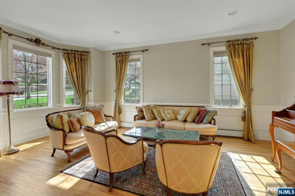 520 Homans Avenue Closter, NJ 07624 - Photo 3 of 34 a living room with furniture and a window