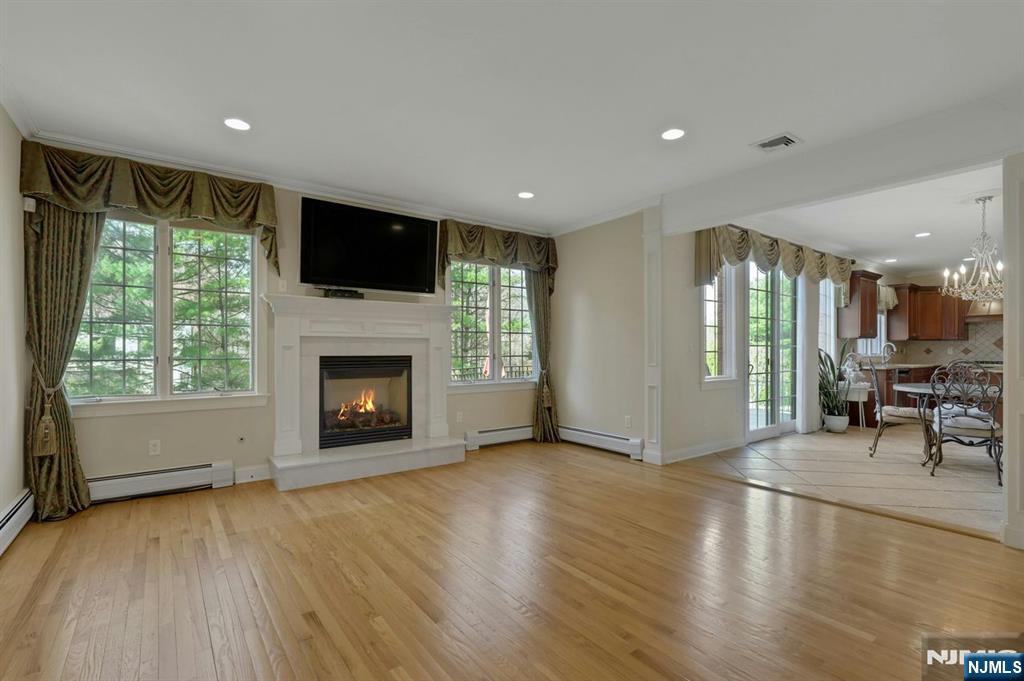 520 Homans Avenue Closter, NJ 07624 - Photo 8 of 34 a view of a livingroom with furniture fire place and a fireplace