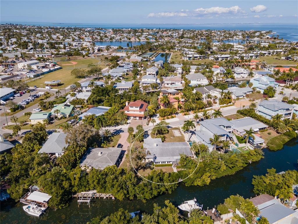 507 58th Street Holmes Beach, FL 34217 - Photo 10 of 19 an aerial view of a house with a lake view