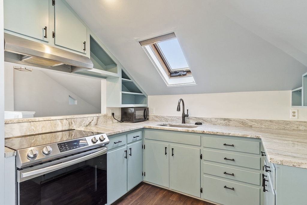 35 Middle Street, Unit 4 Gloucester, MA 01930 - Photo 11 of 28 a kitchen with a stove oven and sink