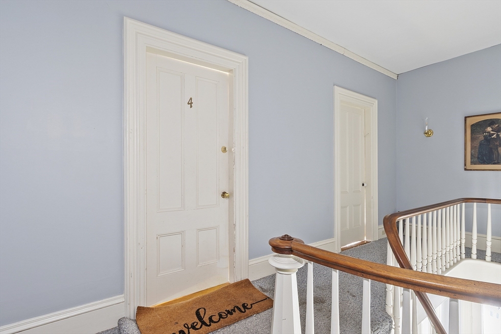 35 Middle Street, Unit 4 Gloucester, MA 01930 - Photo 2 of 28 a view of a hallway with a bedroom