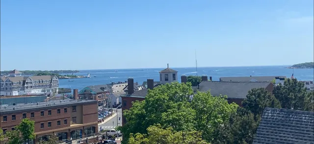a view of a city with tall buildings in the background