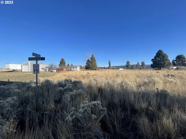 a view of a lake and a yard