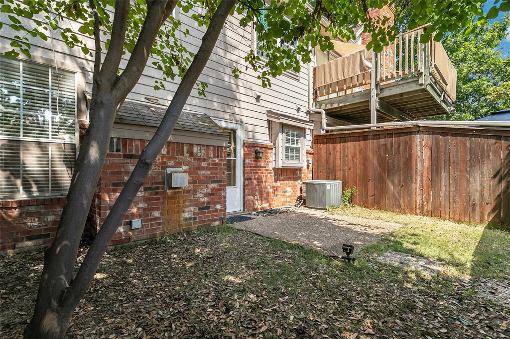 18240 Midway Road, Unit 1004 Dallas, TX 75287 - Photo 22 of 22 a backyard of a house