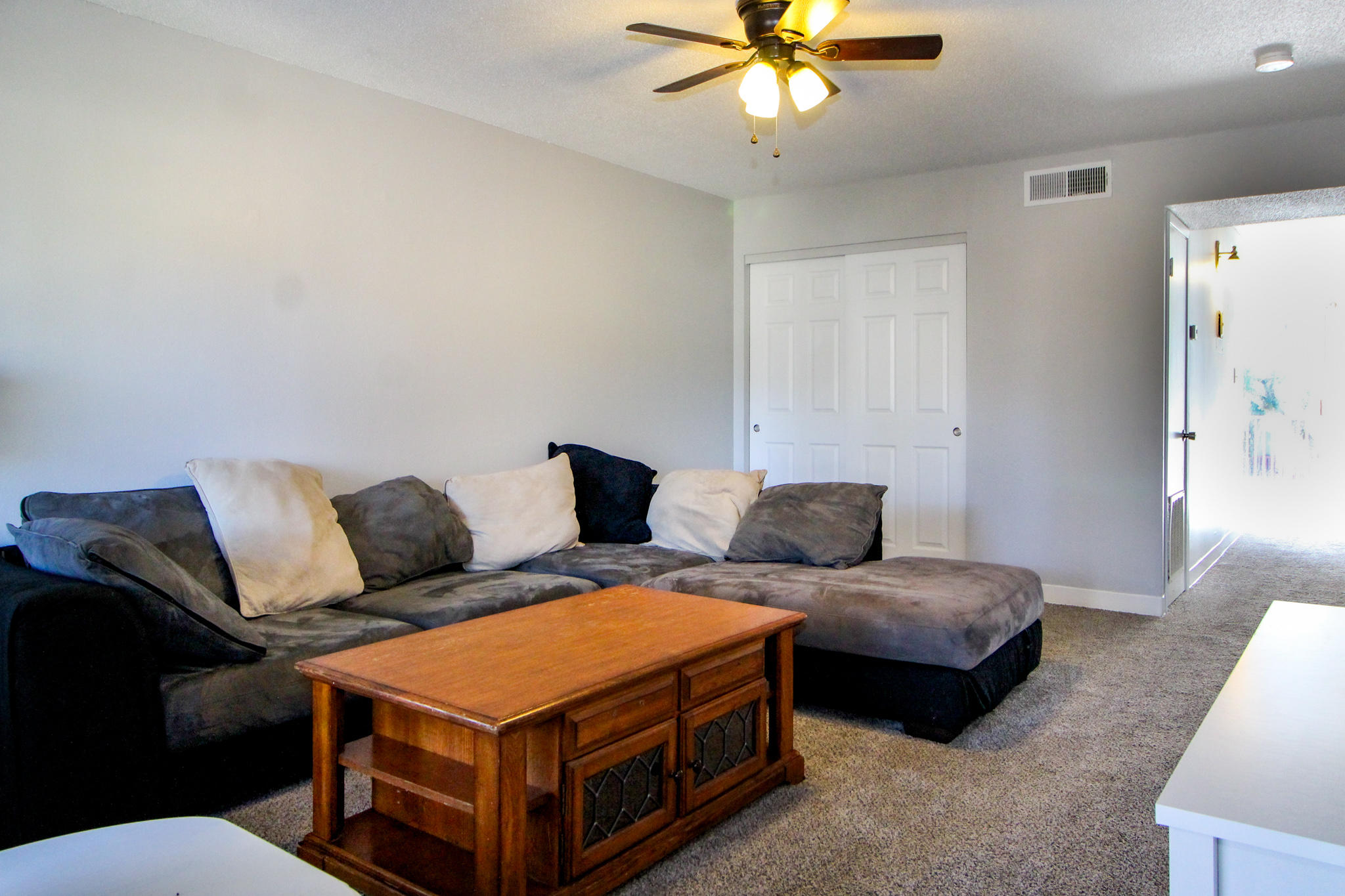 210 Pelham Road, Unit 218A Fort Walton Beach, FL 32547 - Photo 1 of 16 a bedroom with two beds and a chandelier