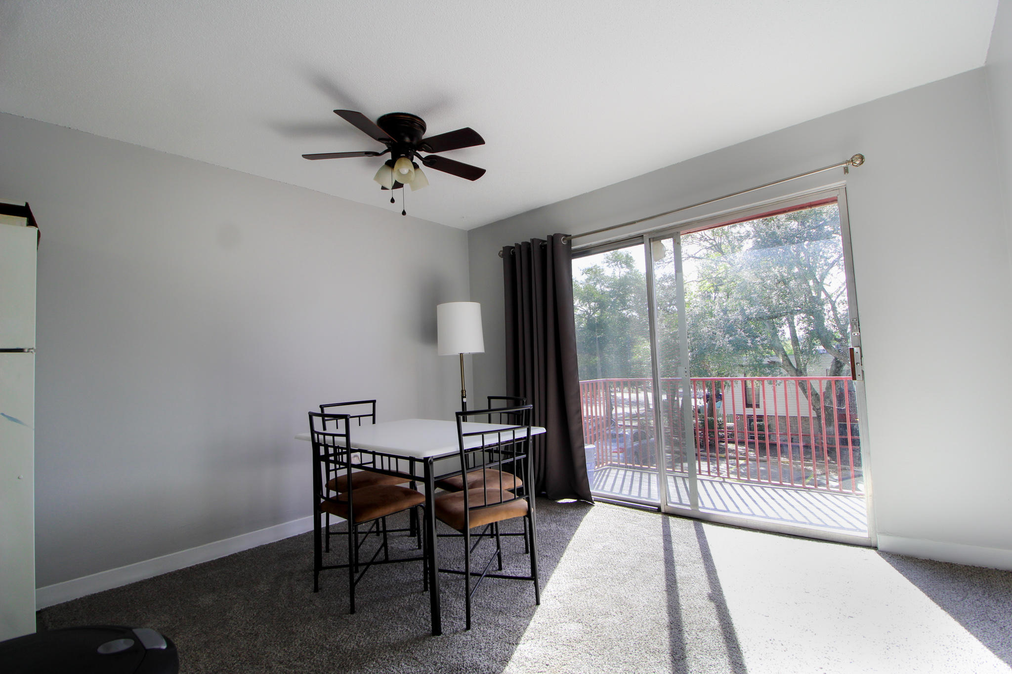 210 Pelham Road, Unit 218A Fort Walton Beach, FL 32547 - Photo 3 of 16 a view of a workspace with furniture and a window