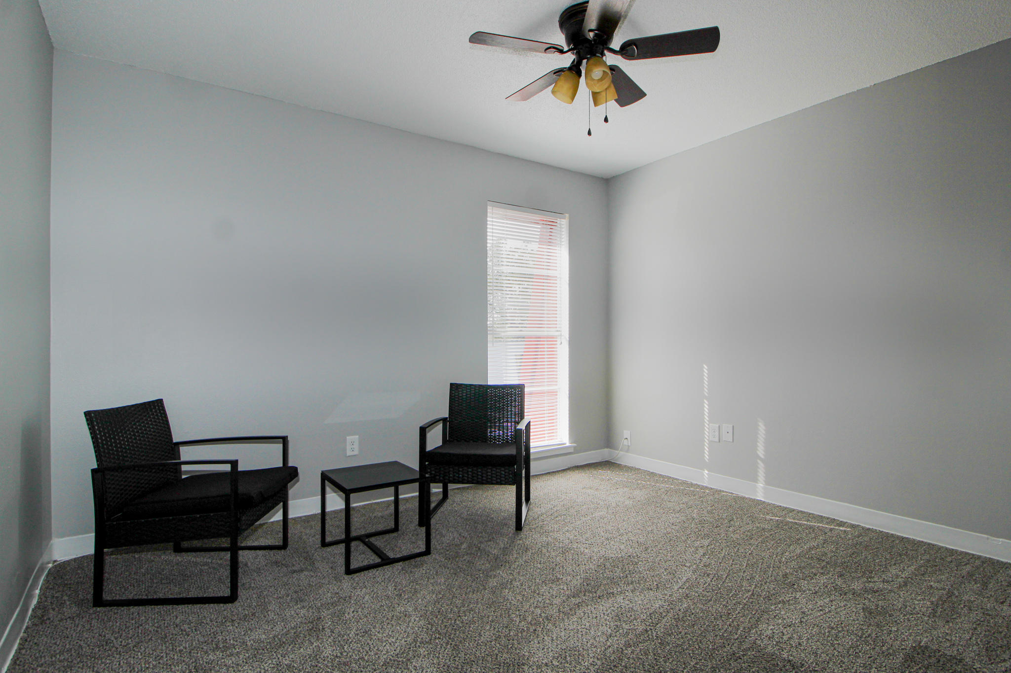 210 Pelham Road, Unit 218A Fort Walton Beach, FL 32547 - Photo 10 of 16 a view of a workspace with furniture and a window
