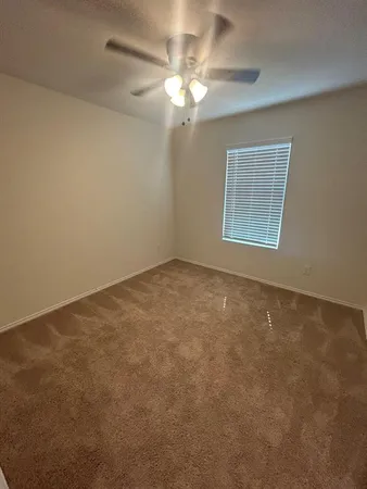 a bathroom with a sink toilet a mirror and shower