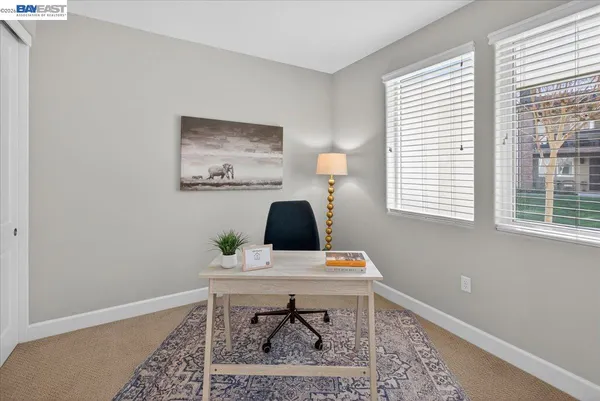 a view of washer and dryer with wooden floor