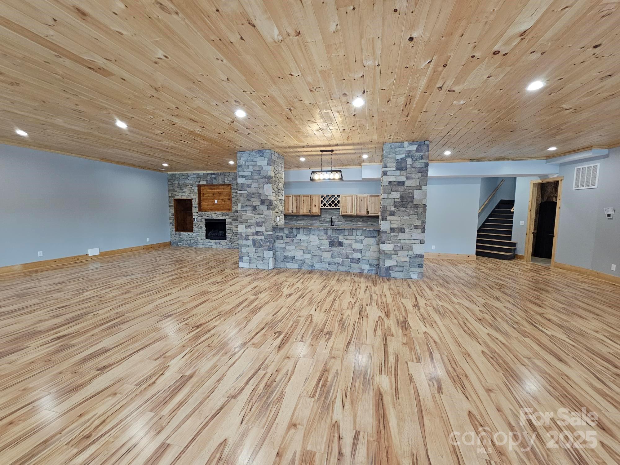 1076 Table View Drive, Unit 55 Morganton, NC 28655 - Photo 11 of 33 an empty room with wooden floor
